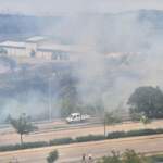 AOÇ Arazisinde Örtü Yangını Çıktı: Alevler Külliye Yakınlarına Ulaştı