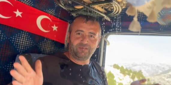 Klimasız kamyonda akıl almaz serinleme yöntemi! Tepeden koltuğa şarıl şarıl akıyor: Şoförden viral çözüm!