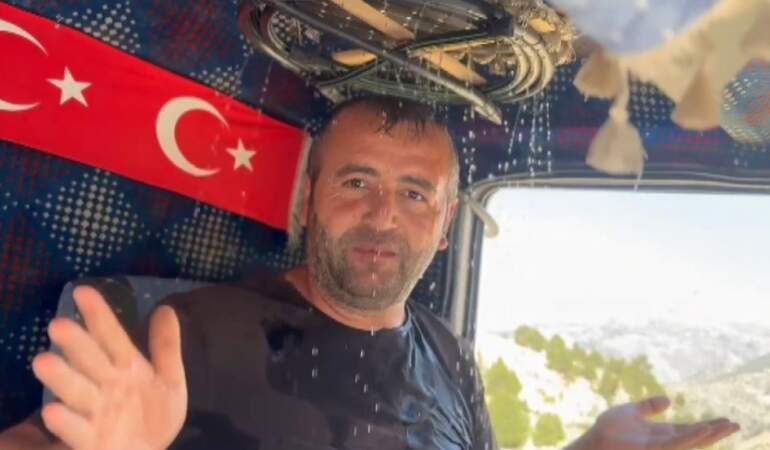 Klimasız kamyonda akıl almaz serinleme yöntemi! Tepeden koltuğa şarıl şarıl akıyor: Şoförden viral çözüm!